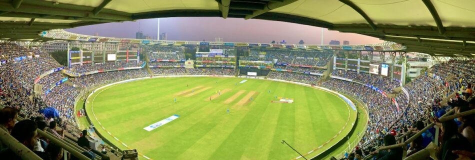 Cricket stadium filled with spectators during a match